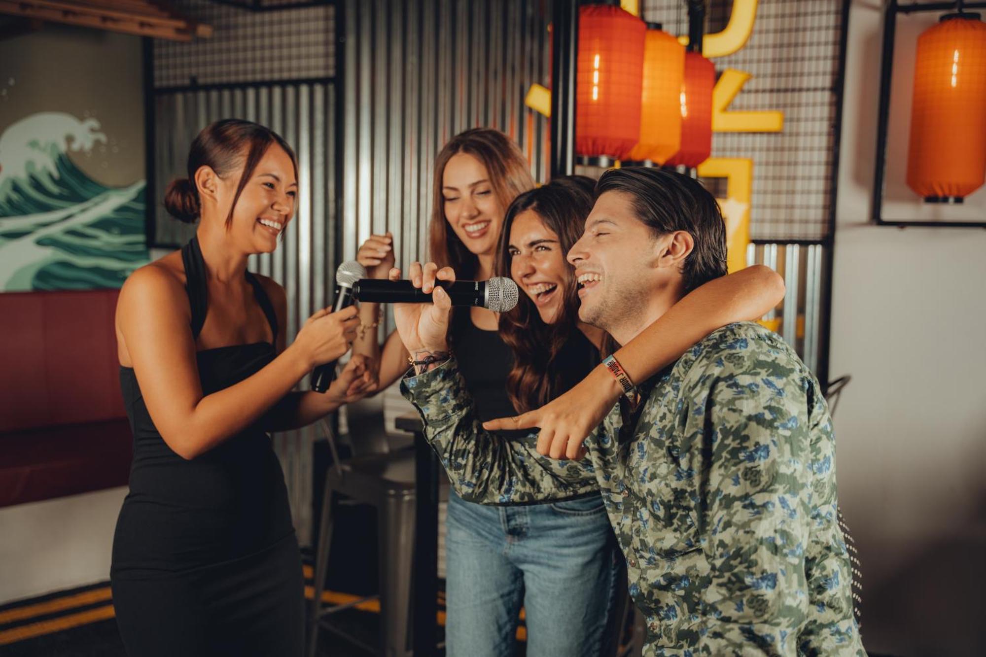 Five Jumeirah Village Dubai Buitenkant foto Friends having fun at a party